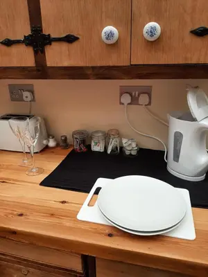 a kitchen counter with a white appliance on a table at Mildenhall Suffolk in Mildenhall
