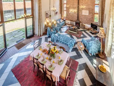 an overhead view of a living room with a table and chairs at St Mary's Chapel in New Buckenham