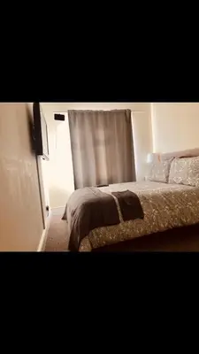a bedroom with a bed and a window at Ac lounge36 Room B in Rochford