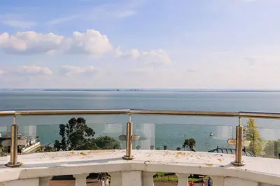 a view of the ocean from a balcony at Muthu Westcliff Hotel (Near London Southend Airport) in Southend-on-Sea