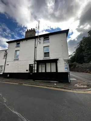 a white building on the side of a street at Cosy entire apartment super king bed near town center in Colchester