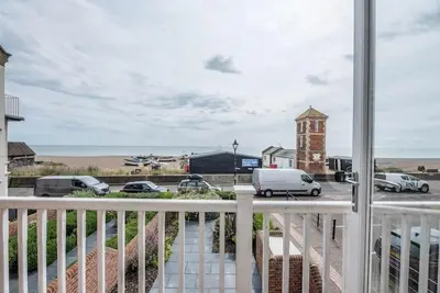 a balcony with a view of a parking lot at Swn-y-Don, Aldeburgh in Aldeburgh