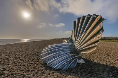 a sculpture of a shell on a beach at Escape in Aldeburgh