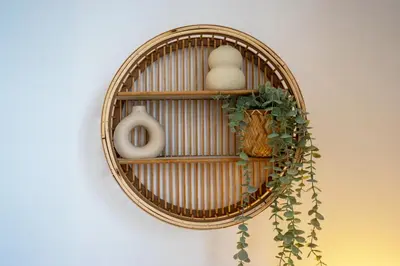 a wicker shelf with eggs and plants on a wall at Boho Style - KING BED, Central, Super FAST Wi-Fi in Cambridge