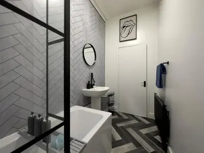 a bathroom with a bath tub and a sink at Swanky Seaside Sanctuary w foozeball - Southend in Southend-on-Sea