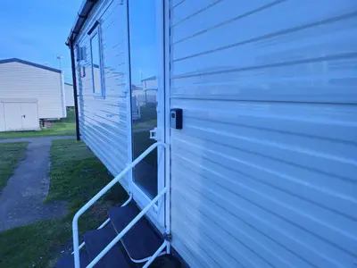 a door on the side of a building at Ultimate serene getaway in East Mersea