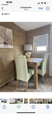 a dining room table with two chairs and a wooden table at Kings head Inn in Stutton