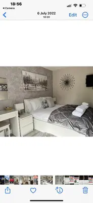 a picture of a bedroom with a bed and a desk at Kings head Inn in Stutton