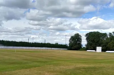 a large grass field with a soccer field at The Walled Garden in Long Melford