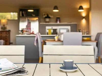 a coffee cup sitting on a table in a kitchen at 2 Bed in Diss oc-51468 in Wortham