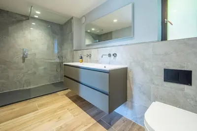 a bathroom with a sink and a shower at Court House, Aldeburgh in Aldeburgh