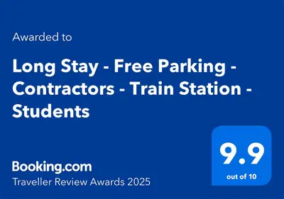 a blue sign that reads long stay free parking confederations train station students at Long Stay - Free Parking - Contractors - Train Station - Students in Colchester