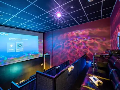 a room with a large projection screen in a theater at 9 Bed in Ipswich oc-62352 in Freston