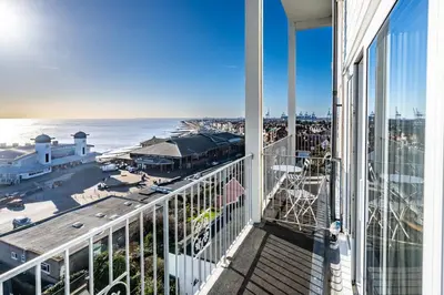 a balcony with a view of the ocean at 19 Undercliffe in Felixstowe