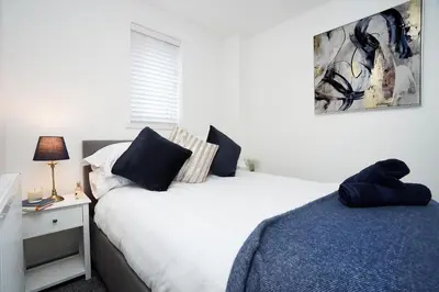 two twin beds in a bedroom with at Lucas in Sudbury