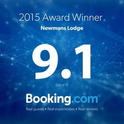 a sign that reads warranted winner of a new humans laureate at Newmans Lodge in Lavenham