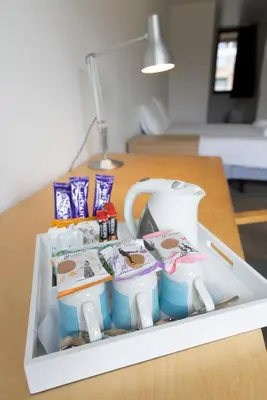a tray filled with food on top of a table at Harvey Court Gonville and Caius College in Cambridge