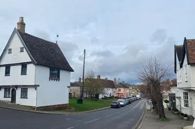 a white house on the side of a street at The Cartlodge, Debenham in Debenham