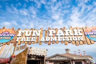 a sign that reads fun park free admission at a theme park at VerbZen Holiday Caravan at St Osyth Beach, Clacton-on-Sea by Verb Holidays in Saint Osyth