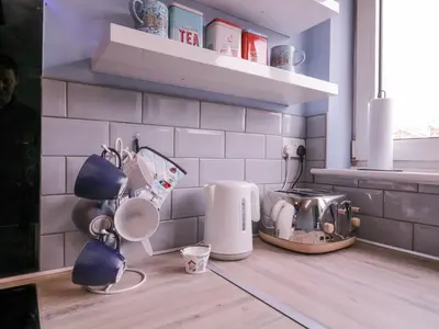 a kitchen with a counter with appliances on it at The Upper Circle in Clacton-on-Sea