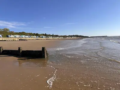 a beach with the ocean and the shoreline at Coastal Nest - Premium flat,3 Minutes to the Beach in Walton-on-the-Naze