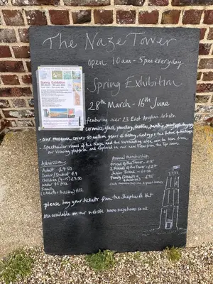 a sign for the nash tavern on a brick wall at Coastal Nest - Premium flat,3 Minutes to the Beach in Walton-on-the-Naze