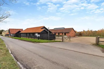 a row of houses on the side of a road at 2 Bed in Heveningham oc-w29035 in Heveningham