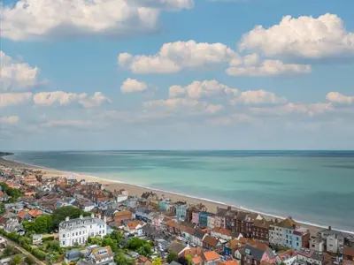 an aerial view of a beach with houses and the ocean at 3 Bed in Aldeburgh oc-o5630 in Aldeburgh