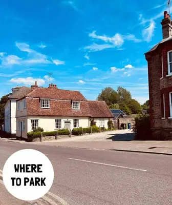 a house on a street with the words where to park at The Hideout in Linton