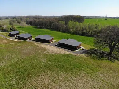 an overhead view of a group of buildings in a field at Meadow Valley Lodge 4 in Ipswich
