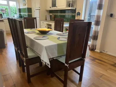 a kitchen with a table with a bowl on it at Cozy 3 bedroom bungalow in rural location in Ashwell