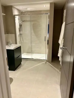 a bathroom with a shower and a sink at Cosy nook in Hardwick