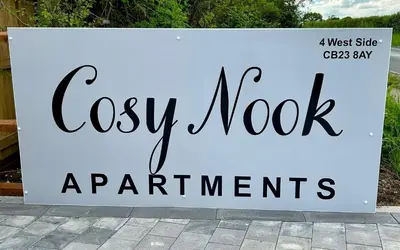 a white sign that says easy node experiences at Cosy nook in Hardwick