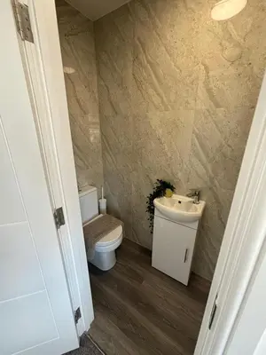 a bathroom with a toilet and a sink at Cosy rooms in Cambridge in Cambridge