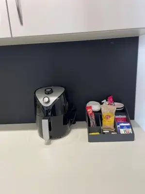 a coffee maker sitting on a counter in a kitchen at Nero view, Southend City High Street in Southend-on-Sea