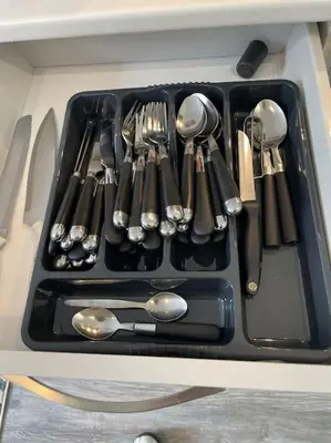 a tray of utensils sitting on top of a counter at Nero view, Southend City High Street in Southend-on-Sea