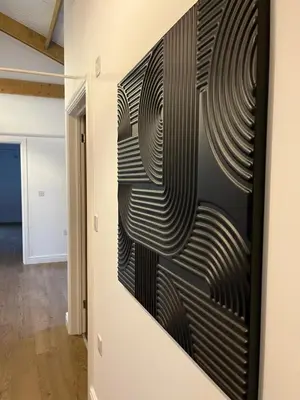 a wall art in a hallway at 3 Bed Barn in Cambridge next to Anglesey Abbey in Cambridge