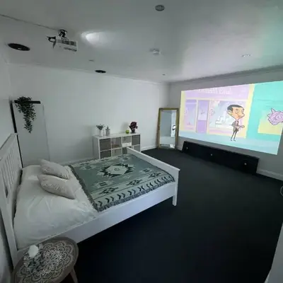 Spacious private cinema guest house