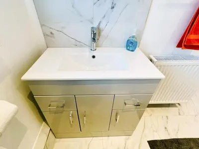a bathroom with a sink and a counter at Sea Leigh in Leigh-on-Sea