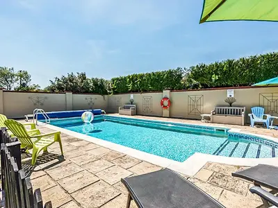 a large swimming pool with chairs at Robin - Uk48171 in Colchester