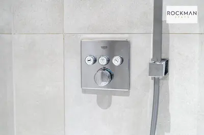 a metal object on a wall with four knobs at Library House Apartments - FREE PARKING - Contractor Hub - Superfast Wi-Fi - Long Term Stays in Brentwood