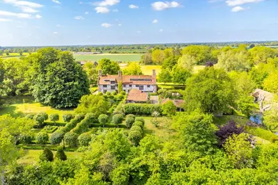 an aerial view of a house with a garden at Spectacular thousand year old Medieval manor house - Flemings Hall in Ipswich