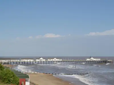 a view of a beach with a pier at The Cart Shed - E1768 in Westleton
