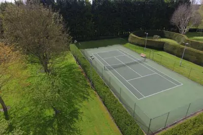 an overhead view of a tennis court in a park at Hockwold Hall - Former Royal residence in Hockwold cum Wilton