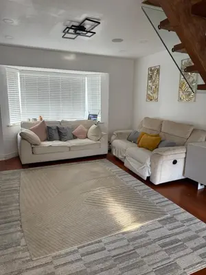 a living room with two couches and a couch at Rose home in Haverhill