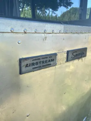two signs on the side of a skate ramp at Bury - Lodge - Sleeps 2 - Parking in Great Welnetham
