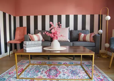 a living room with a couch and a table at 4x Bed Elegant Home with Parking in Ely