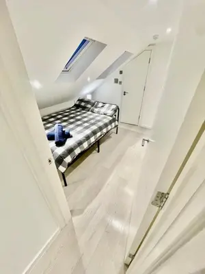 a bedroom with a bed in a room at cozy 1 bedroom flat near cambridge city centre in Milton