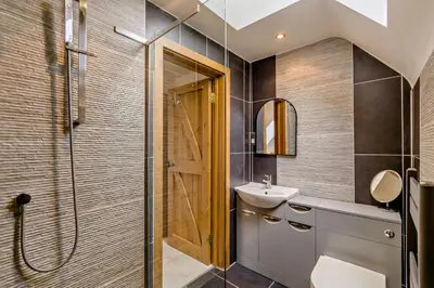 a bathroom with a sink and a shower at Finest Retreats - The House at No 47 in West Wickham