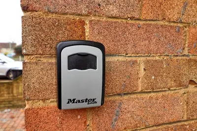 a black and white object on a brick wall at Cozy Modern Home Basildon Long stay Contractors Sleeps 6 in Basildon